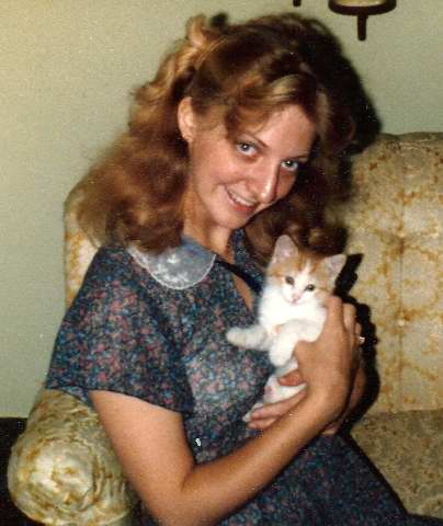 Debbie with her first cat, Spicy